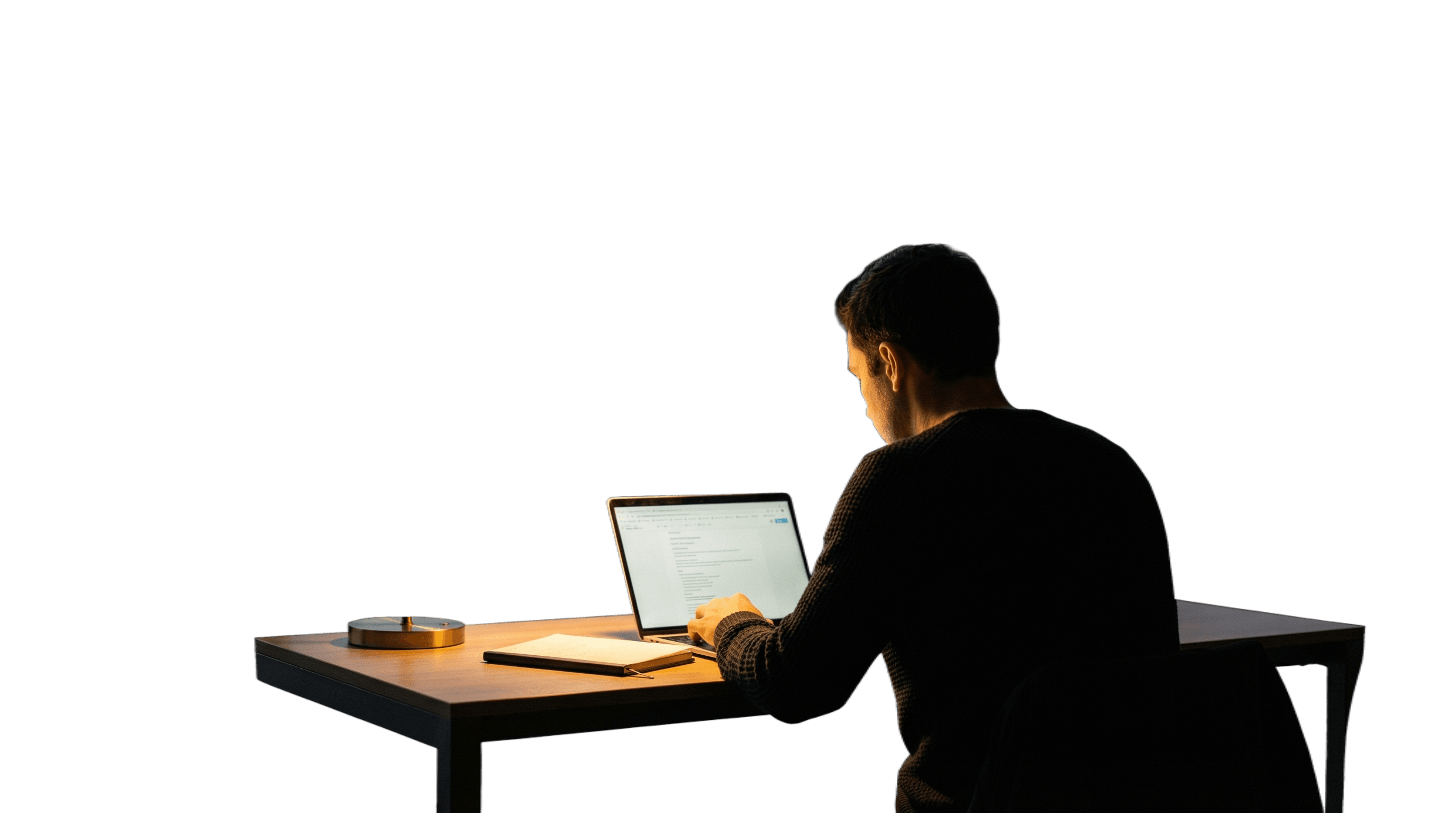 Man working at desk late at night